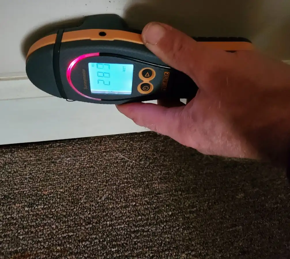 Moisture detection at baseboard during Storm Damage Restoration in Asbury Park